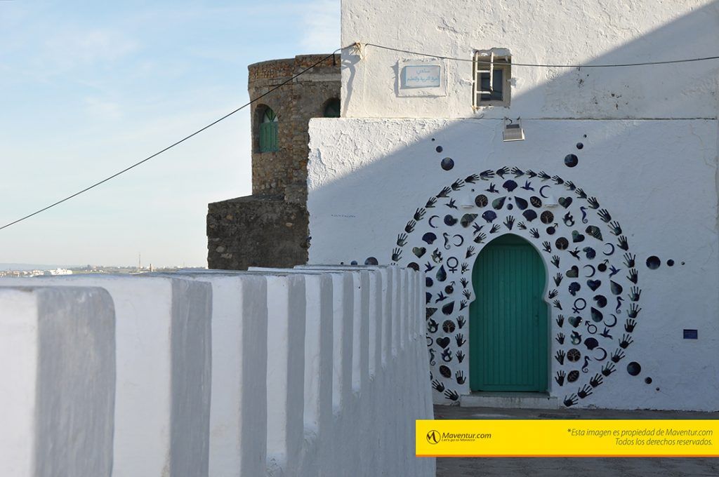 asilah-arcila-tour-maventur-viajes-travel-puerta-manos-simbolos-pajaros-fotografica-fotografia-foto